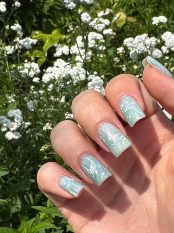 Summer backyard session: grill, dog, nails, and garden life