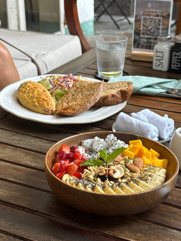 Breakfast meal documented on wooden table in Đà Nẵng