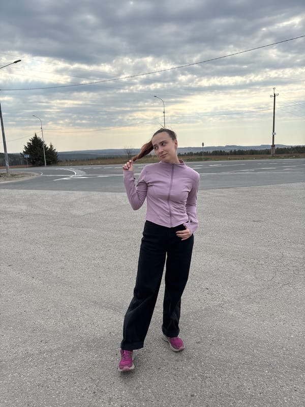 Tourist documents brief visit to Verkh-Sosnova, Russia with selfies
