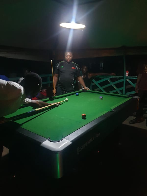 Late-night pool session at an outdoor spot in Lokoja