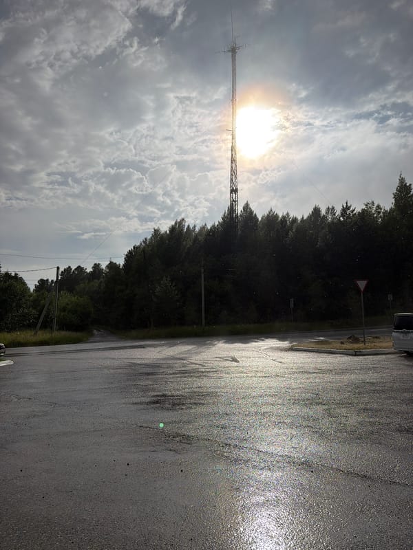 Transmission tower along a remote Russian roadside