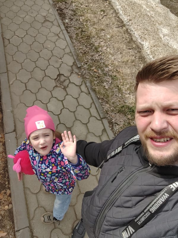 Father and daughter enjoy early morning park visit