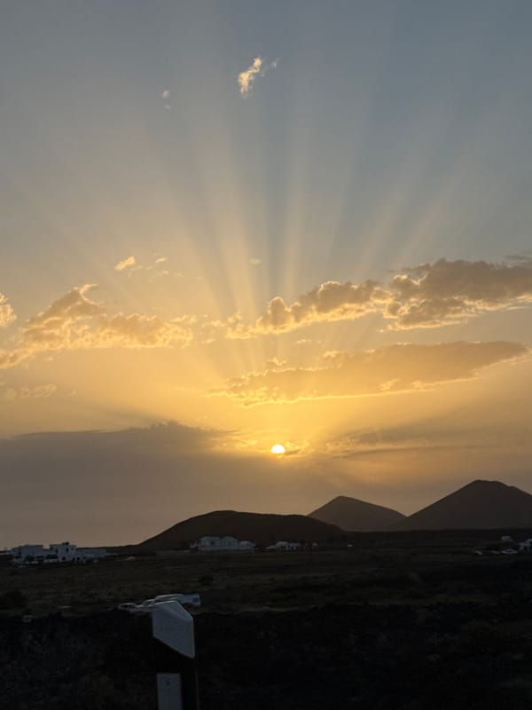 Sunset with crepuscular rays observed in Yaiza, Spain