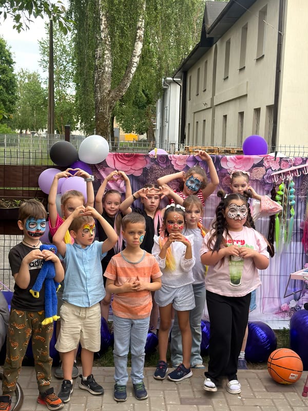Children's outdoor party gathering documented in Riga, Latvia
