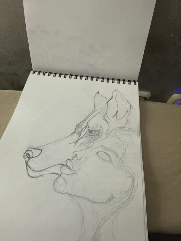 Artist sketches intimate human-dog embrace in Bulgarian sketchbook