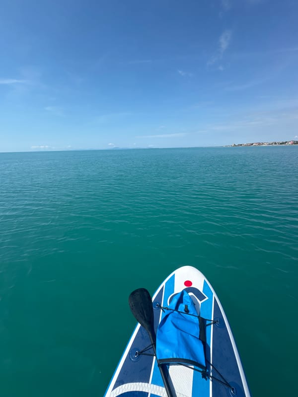 Morning paddleboard session captured in calm turquoise waters