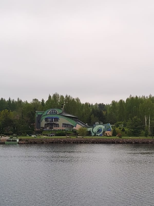 Two unique waterfront houses observed along shoreline