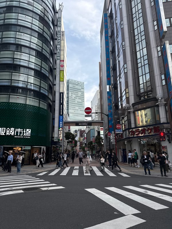 Street-level tour through Shinjuku's busy commercial district