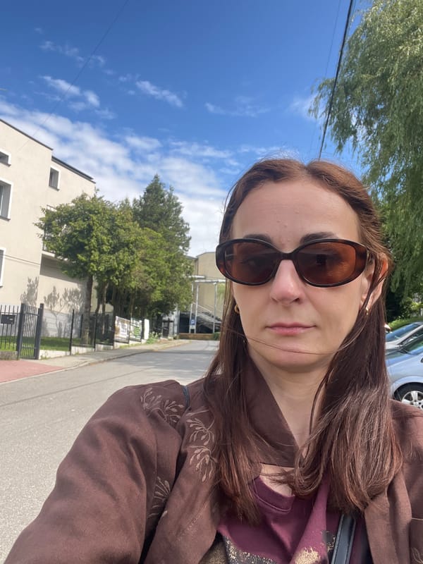 Woman documents sunny afternoon at swimming pool complex