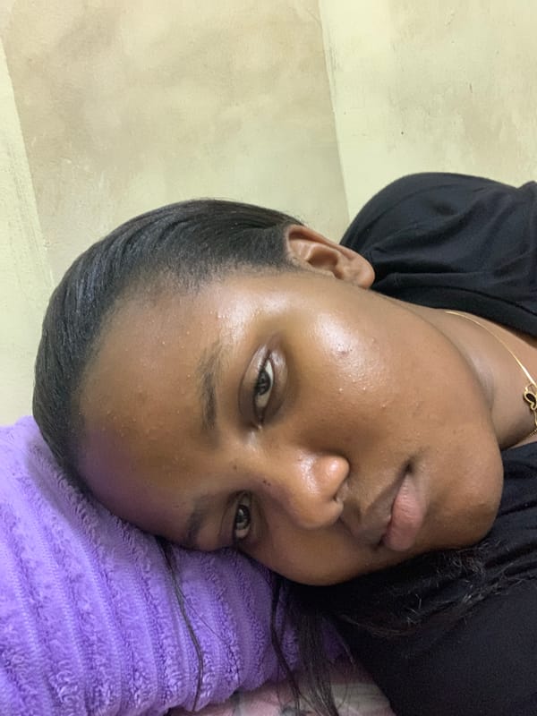 Women pose for photos during indoor gathering in Dar es Salaam