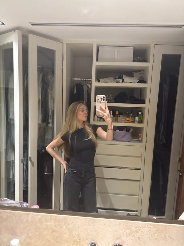 Woman takes mirror selfies in Mexico City closet