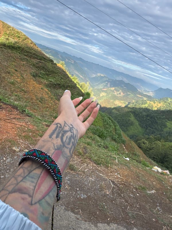 Motorcycle travelers document brief mountain stop in northern Vietnam