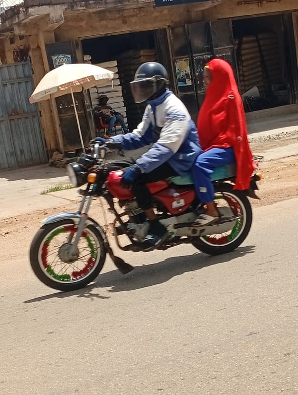Street-level commercial life across Jos, Nigeria