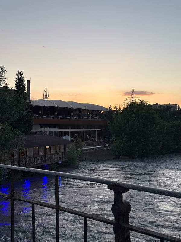 Dusk along the Astrakhan riverfront, restaurant and embankment views