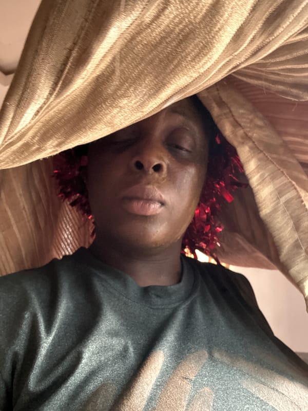 Nigerian resident celebrates then cooks traditional meal in kitchen