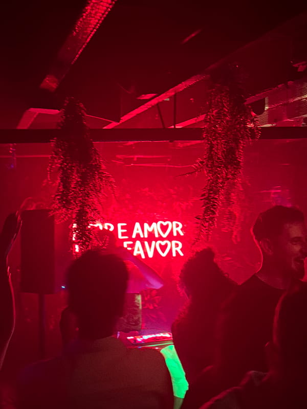 Red-lit bar interior captured in early morning Provincetown