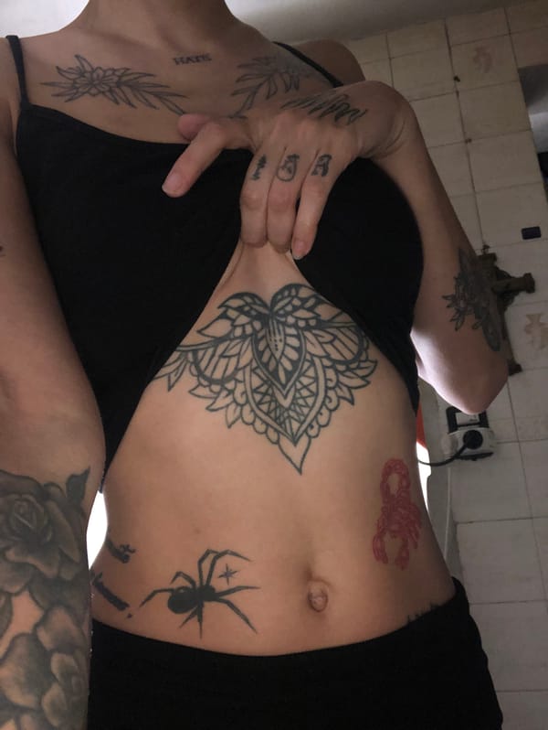 Tattooed individual observed in Buenos Aires