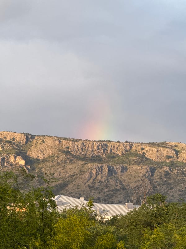 Rainbow appears over Podgorica mountains amid mixed skies