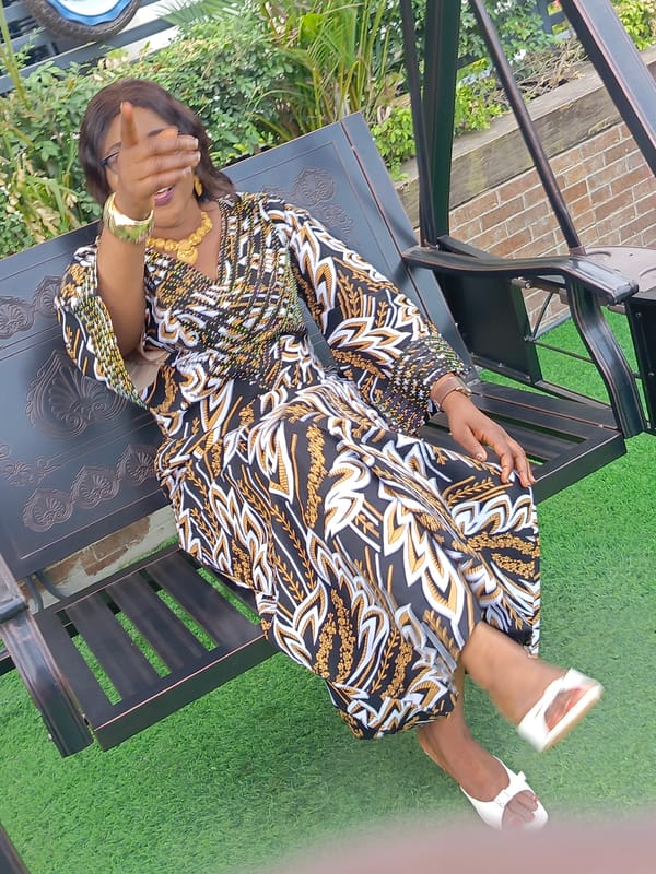 Casual outdoor gathering captured in Akwanga, Nigeria