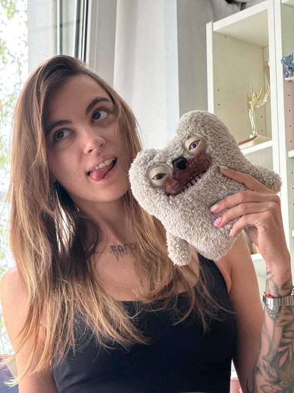 Goofing around with a plush toy in a Moscow room