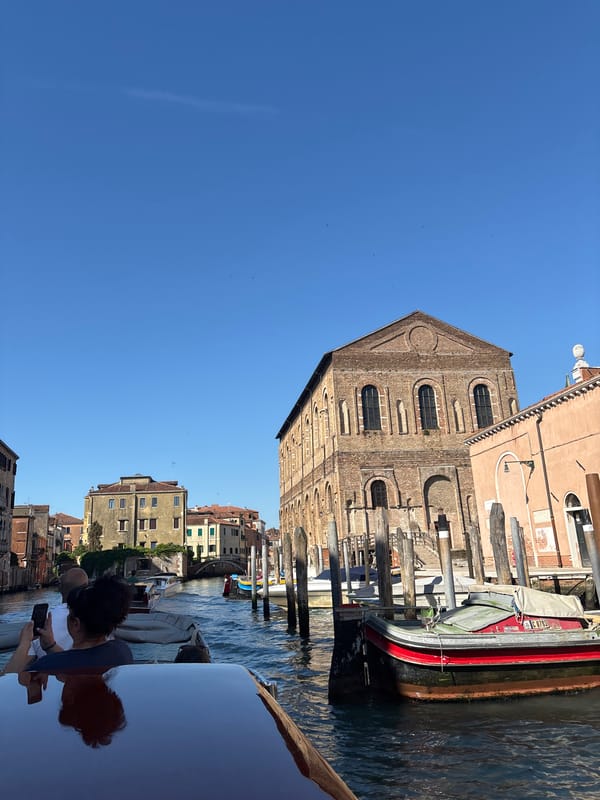 Venice canal scenes captured during sunny morning boat tour