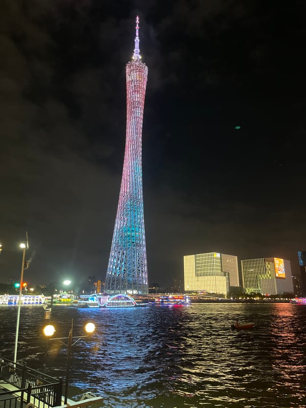 Guangzhou's Tianhe waterfront lights up on a summer night