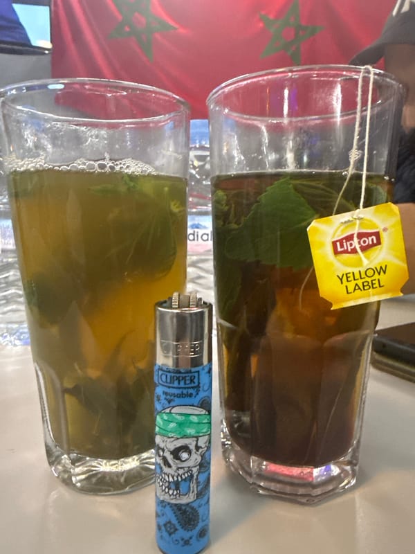 Tea service documented in Tangier with Moroccan flag visible