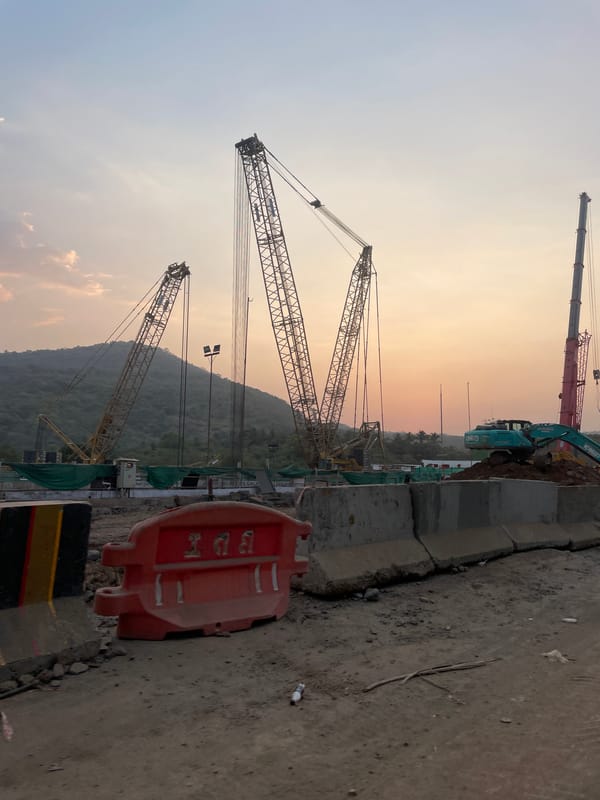 Mumbai construction site photographed during sunset hours