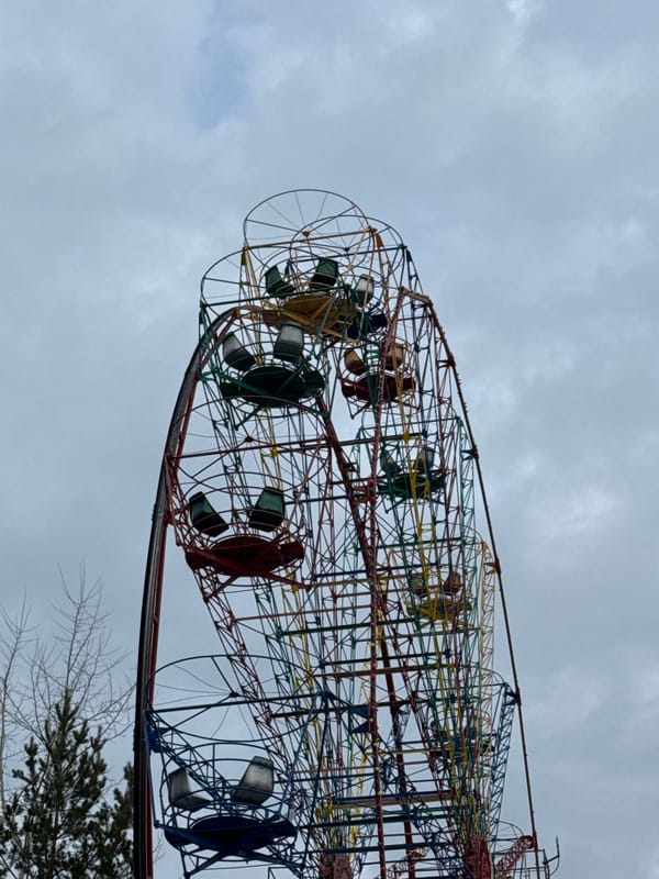 Fairground ride and monument documented in afternoon observations