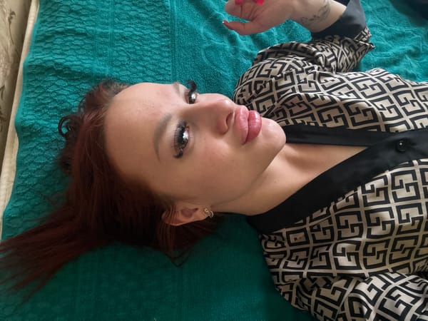 Woman resting on green surface in Simferopol