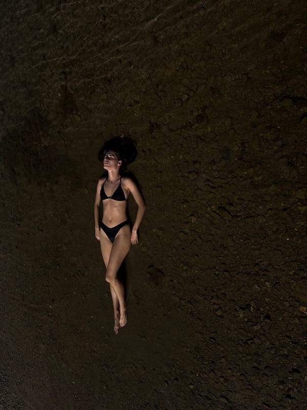 Floating in the shallows along Montenegro's Bay of Kotor