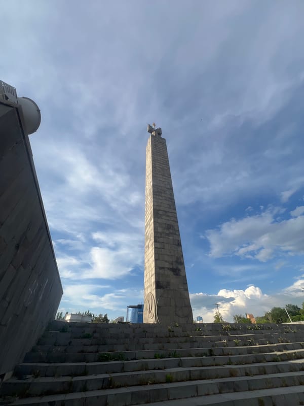 Photographer documents Yerevan monuments and cityscape under cloudy skies