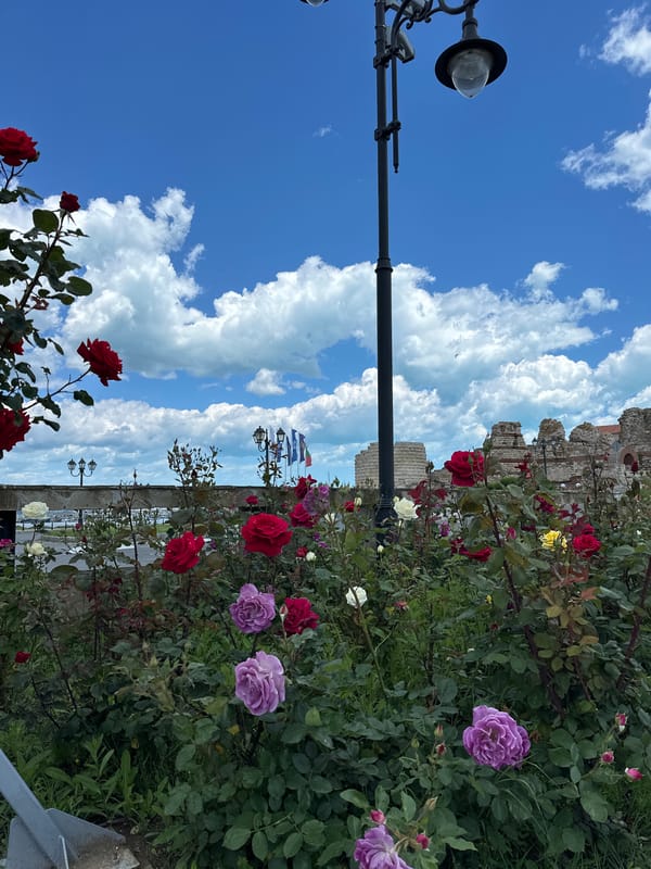 Tourist captures scenic landmarks in historic Nesebar, Bulgaria