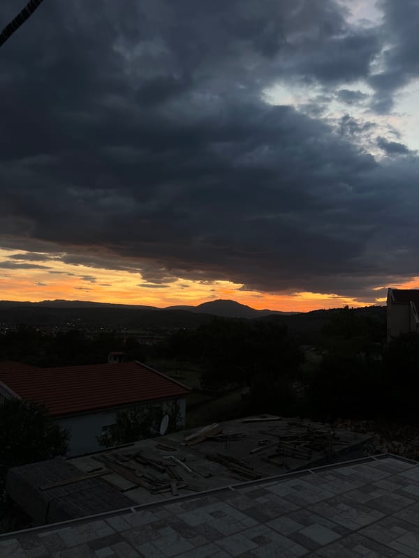 Dramatic sunset splits sky over Podgorica, Montenegro