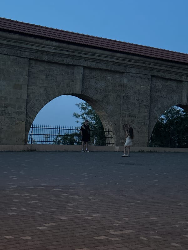 Evening stroll through a historic park and plaza in Odesa