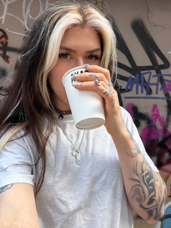 Portrait session documented against graffiti wall in Budva