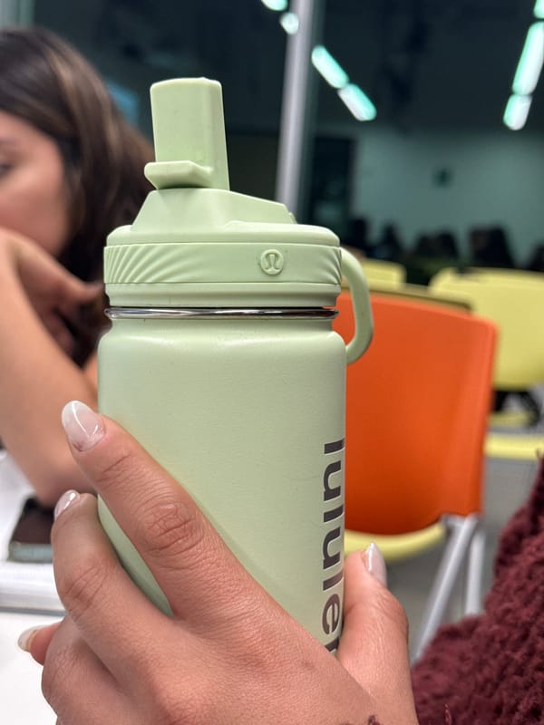 Person enjoys traditional esquites street food in Mexico City
