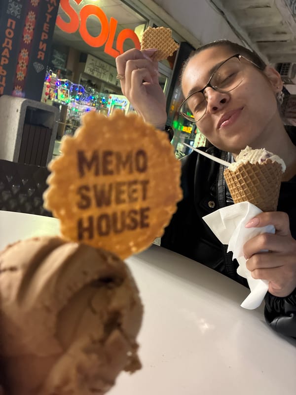 Person enjoys ice cream and waffle in Plovdiv