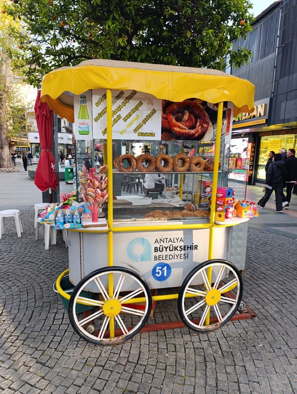 Tourist explores Antalya shopping district during afternoon stroll