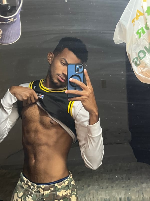 Young man poses for selfies in Lakers jersey in Porlamar