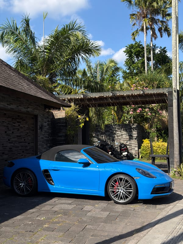 Blue Porsche and street life in North Kuta, Bali