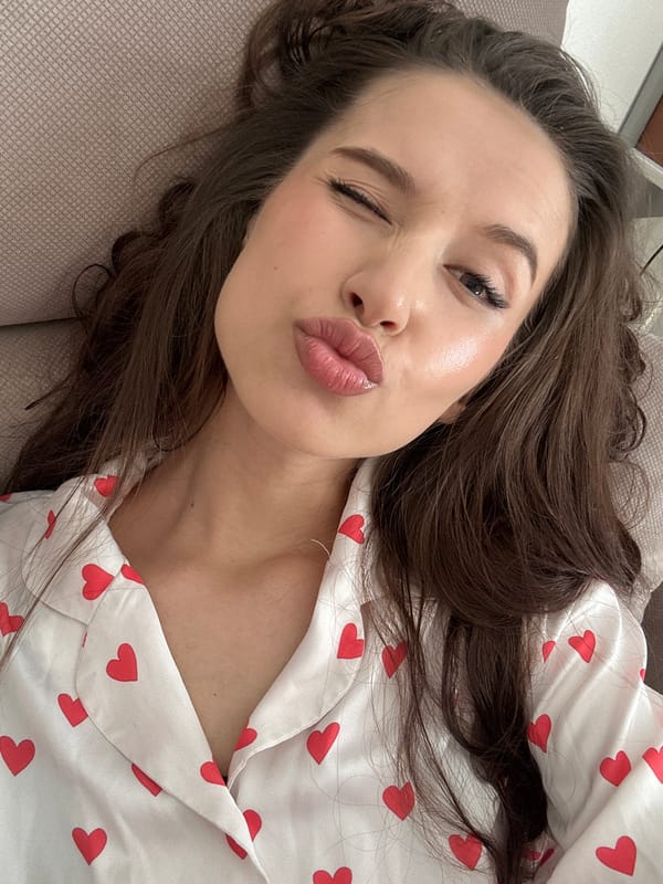 Woman takes morning selfies in heart-patterned pajamas in Yekaterinburg
