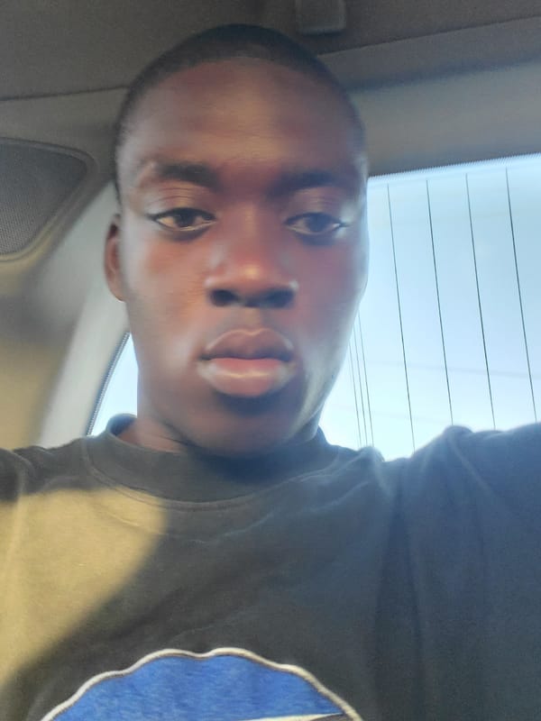 Man takes selfie in car in Onitsha, Nigeria