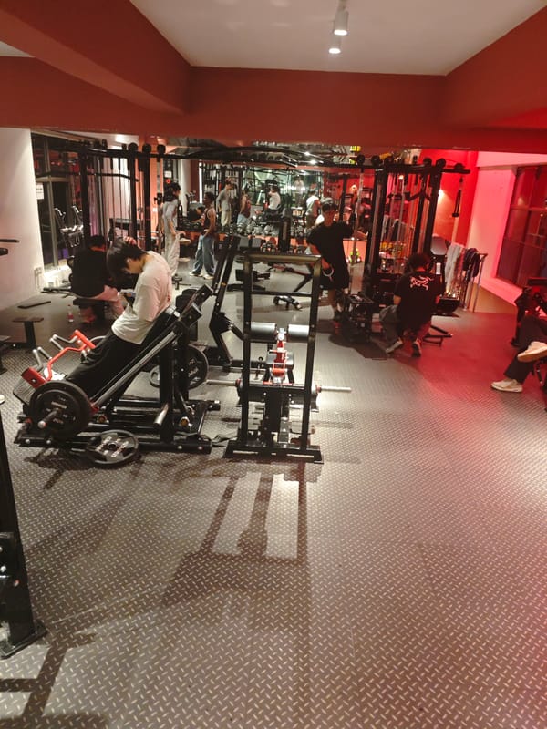 Gym workout and cats on deck captured in Chongqing