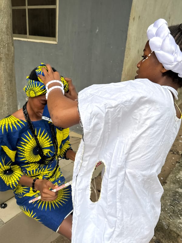 Traditional headwrap ceremony between two women in Badagry, Nigeria
