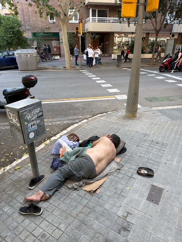 Medical emergency response captured on Barcelona street near florist