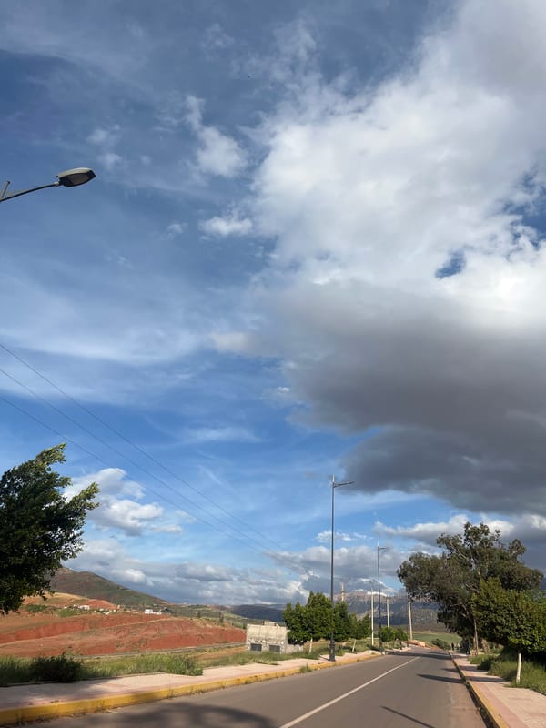 Street scenes documented in Ouaouizert, Morocco under cloudy skies