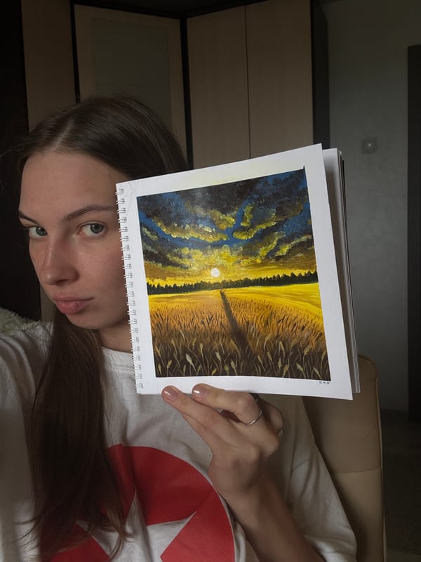 Artist documents sunset wheat field paintings in Perm bedroom studio