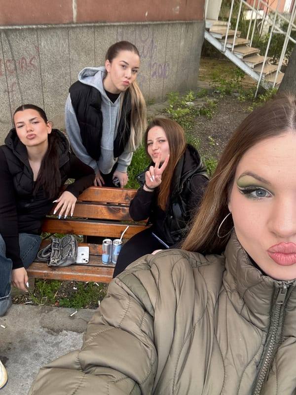 Young women take group selfies outdoors in Plovdiv