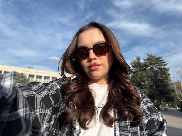 Woman takes selfies in public space in Bataysk